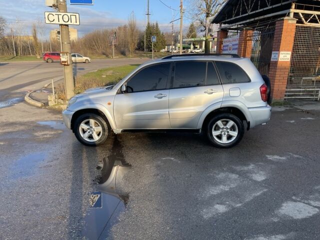 Серый Тойота РАВ 4, объемом двигателя 2 л и пробегом 244 тыс. км за 3650 $, фото 2 на Automoto.ua