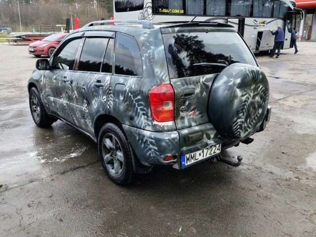 Серый Тойота РАВ 4, объемом двигателя 2 л и пробегом 290 тыс. км за 3050 $, фото 3 на Automoto.ua