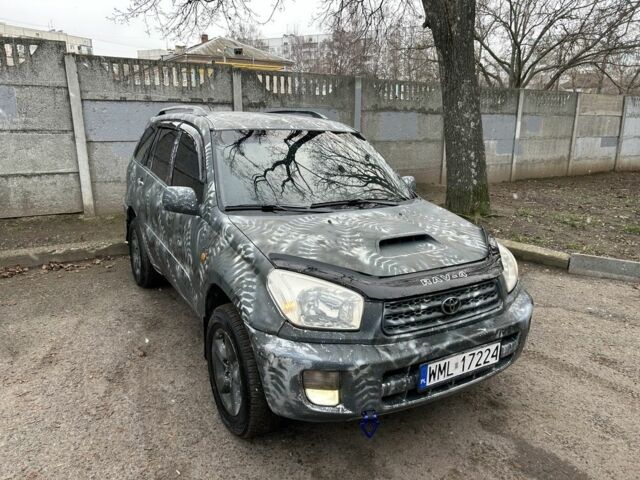 Серый Тойота РАВ 4, объемом двигателя 2 л и пробегом 288 тыс. км за 3400 $, фото 1 на Automoto.ua