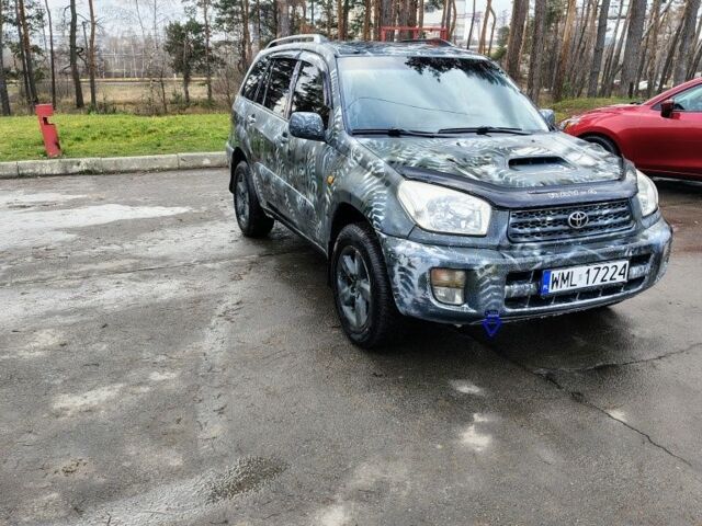 Серый Тойота РАВ 4, объемом двигателя 2 л и пробегом 290 тыс. км за 3050 $, фото 1 на Automoto.ua