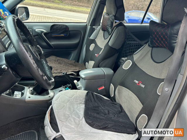 Серый Тойота РАВ 4, объемом двигателя 2 л и пробегом 430 тыс. км за 6600 $, фото 6 на Automoto.ua