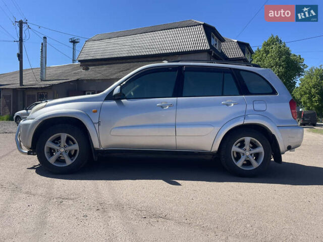 Серый Тойота РАВ 4, объемом двигателя 2 л и пробегом 266 тыс. км за 4999 $, фото 2 на Automoto.ua