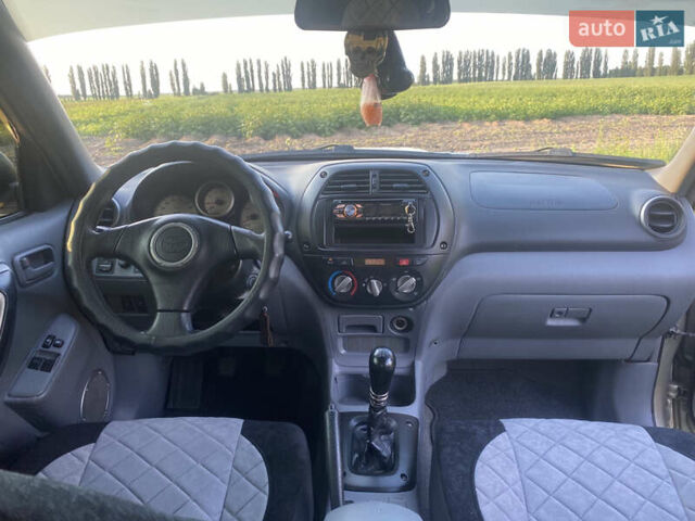 Серый Тойота РАВ 4, объемом двигателя 2 л и пробегом 345 тыс. км за 7800 $, фото 5 на Automoto.ua