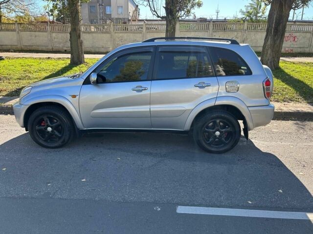 Серый Тойота РАВ 4, объемом двигателя 2 л и пробегом 198 тыс. км за 7000 $, фото 1 на Automoto.ua