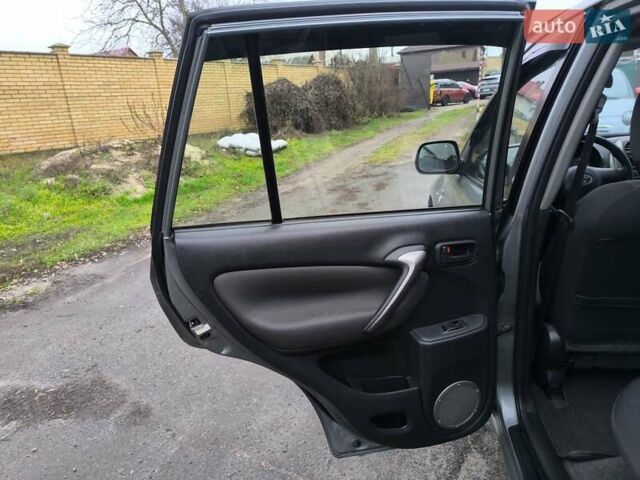 Серый Тойота РАВ 4, объемом двигателя 2 л и пробегом 130 тыс. км за 6800 $, фото 18 на Automoto.ua