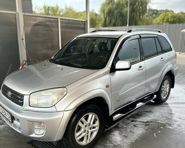 Серый Тойота РАВ 4, объемом двигателя 2 л и пробегом 245 тыс. км за 6499 $, фото 2 на Automoto.ua