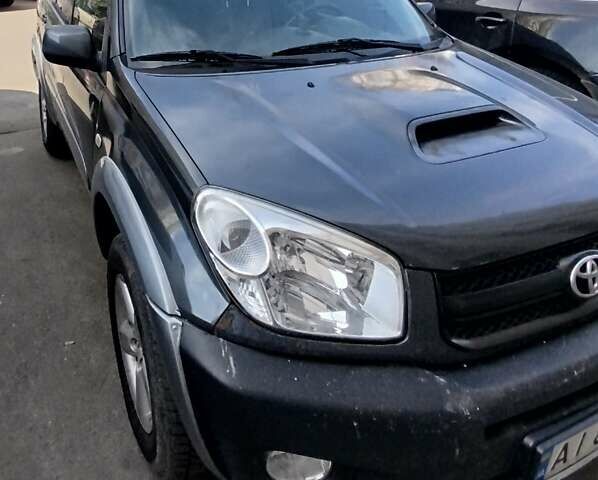 Серый Тойота РАВ 4, объемом двигателя 2 л и пробегом 300 тыс. км за 4200 $, фото 1 на Automoto.ua