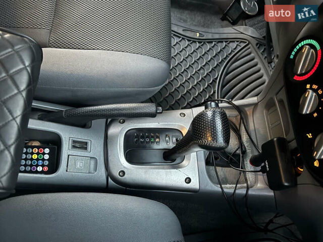 Сірий Тойота РАВ 4, об'ємом двигуна 2 л та пробігом 198 тис. км за 6999 $, фото 12 на Automoto.ua