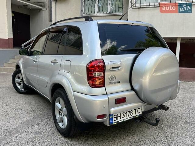 Серый Тойота РАВ 4, объемом двигателя 2 л и пробегом 153 тыс. км за 7200 $, фото 2 на Automoto.ua