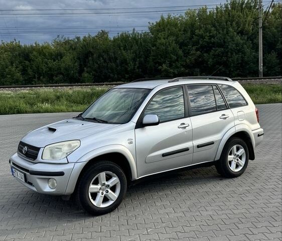 Серый Тойота РАВ 4, объемом двигателя 2 л и пробегом 290 тыс. км за 4600 $, фото 1 на Automoto.ua
