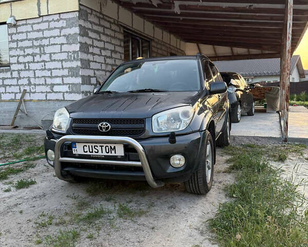Серый Тойота РАВ 4, объемом двигателя 2 л и пробегом 283 тыс. км за 7200 $, фото 2 на Automoto.ua