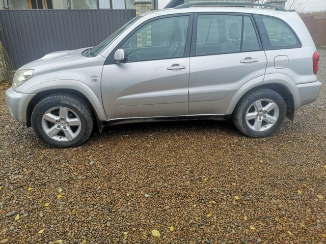 Серый Тойота РАВ 4, объемом двигателя 2 л и пробегом 241 тыс. км за 7000 $, фото 2 на Automoto.ua