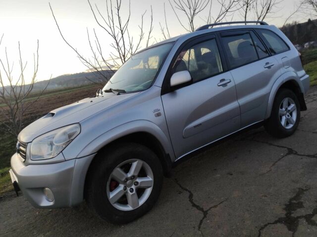 Серый Тойота РАВ 4, объемом двигателя 2 л и пробегом 320 тыс. км за 3800 $, фото 1 на Automoto.ua