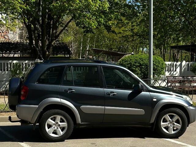 Сірий Тойота РАВ 4, об'ємом двигуна 2 л та пробігом 350 тис. км за 7500 $, фото 3 на Automoto.ua
