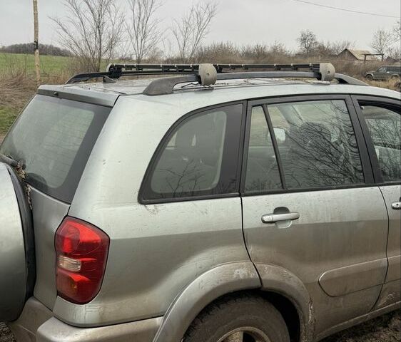 Серый Тойота РАВ 4, объемом двигателя 2 л и пробегом 365 тыс. км за 3500 $, фото 4 на Automoto.ua