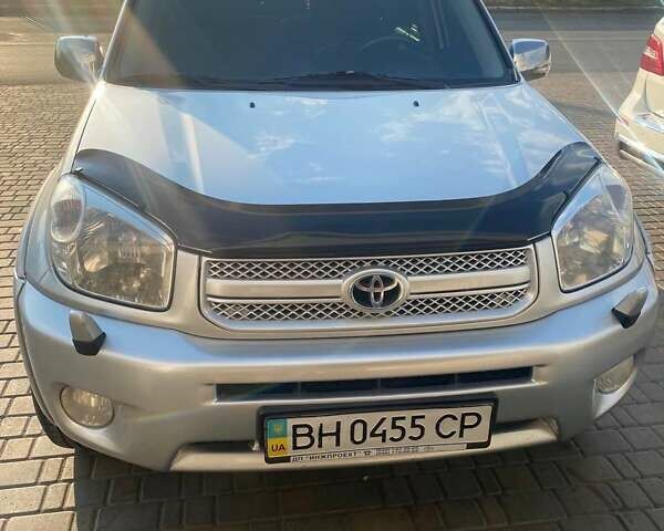Серый Тойота РАВ 4, объемом двигателя 2 л и пробегом 350 тыс. км за 8400 $, фото 3 на Automoto.ua