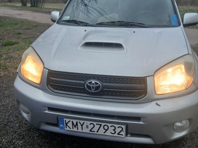 Серый Тойота РАВ 4, объемом двигателя 2 л и пробегом 416 тыс. км за 3000 $, фото 2 на Automoto.ua