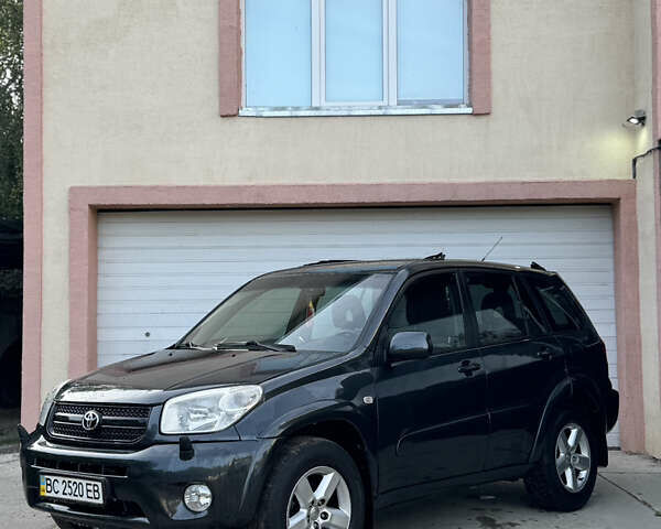 Серый Тойота РАВ 4, объемом двигателя 2 л и пробегом 245 тыс. км за 6000 $, фото 2 на Automoto.ua