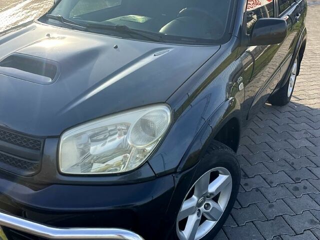 Серый Тойота РАВ 4, объемом двигателя 2 л и пробегом 350 тыс. км за 6500 $, фото 3 на Automoto.ua