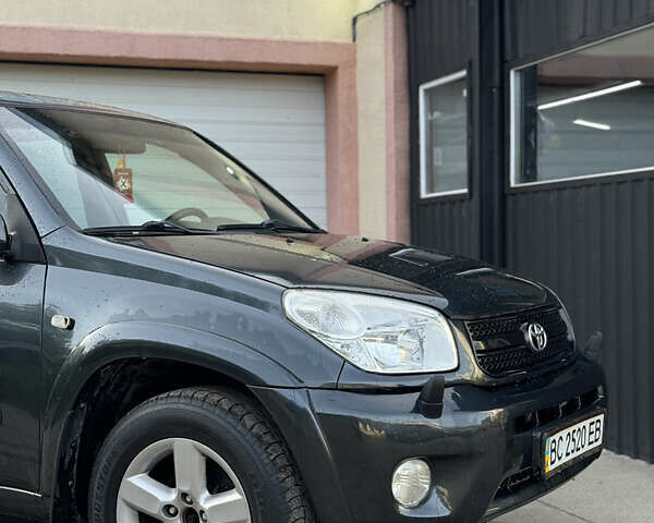 Серый Тойота РАВ 4, объемом двигателя 2 л и пробегом 245 тыс. км за 6000 $, фото 5 на Automoto.ua