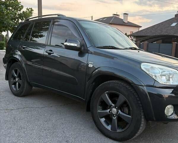 Сірий Тойота РАВ 4, об'ємом двигуна 2 л та пробігом 170 тис. км за 9999 $, фото 4 на Automoto.ua