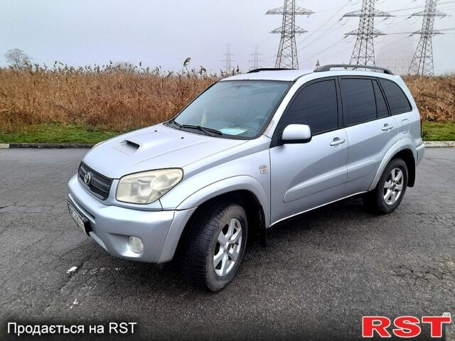 Серый Тойота РАВ 4, объемом двигателя 2 л и пробегом 331 тыс. км за 5500 $, фото 1 на Automoto.ua