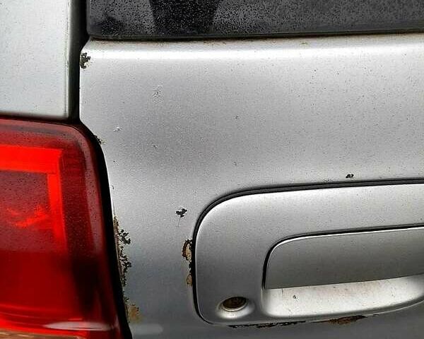 Серый Тойота РАВ 4, объемом двигателя 2 л и пробегом 331 тыс. км за 5500 $, фото 3 на Automoto.ua