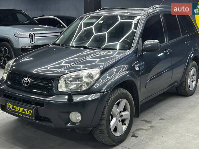 Сірий Тойота РАВ 4, об'ємом двигуна 2 л та пробігом 257 тис. км за 10200 $, фото 2 на Automoto.ua