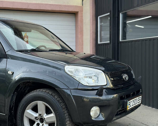 Серый Тойота РАВ 4, объемом двигателя 2 л и пробегом 245 тыс. км за 6000 $, фото 4 на Automoto.ua