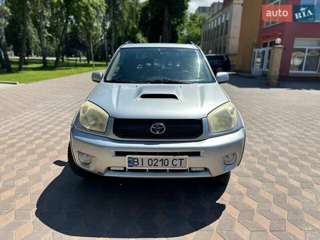 Серый Тойота РАВ 4, объемом двигателя 2 л и пробегом 247 тыс. км за 8399 $, фото 3 на Automoto.ua