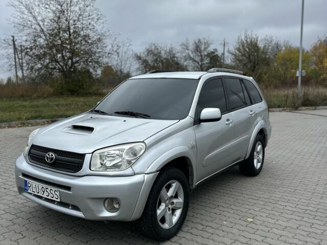 Серый Тойота РАВ 4, объемом двигателя 2 л и пробегом 390 тыс. км за 3850 $, фото 1 на Automoto.ua