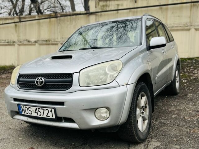 Серый Тойота РАВ 4, объемом двигателя 2 л и пробегом 318 тыс. км за 3800 $, фото 1 на Automoto.ua