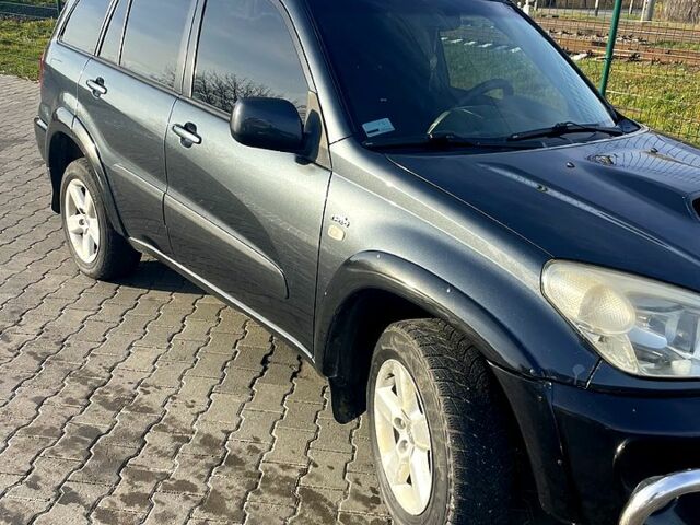 Серый Тойота РАВ 4, объемом двигателя 2 л и пробегом 350 тыс. км за 6500 $, фото 2 на Automoto.ua
