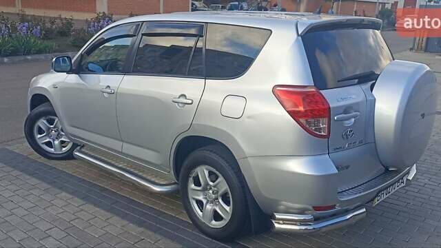 Серый Тойота РАВ 4, объемом двигателя 2.36 л и пробегом 213 тыс. км за 8500 $, фото 3 на Automoto.ua
