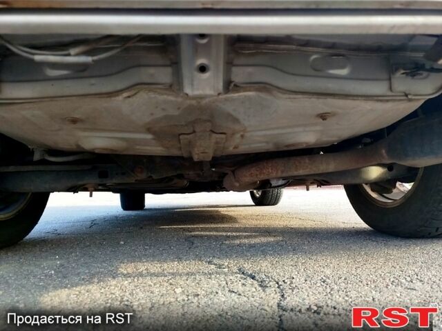 Серый Тойота РАВ 4, объемом двигателя 2 л и пробегом 196 тыс. км за 9100 $, фото 2 на Automoto.ua