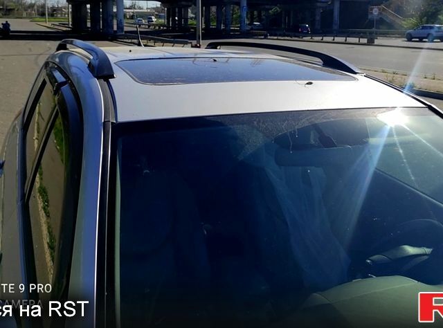 Серый Тойота РАВ 4, объемом двигателя 2.4 л и пробегом 164 тыс. км за 9100 $, фото 3 на Automoto.ua