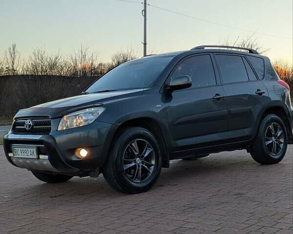 Сірий Тойота РАВ 4, об'ємом двигуна 2 л та пробігом 234 тис. км за 7950 $, фото 2 на Automoto.ua