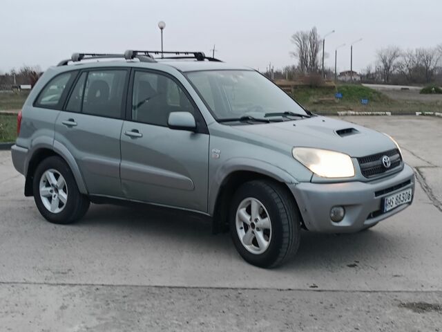 Серый Тойота РАВ 4, объемом двигателя 2 л и пробегом 260 тыс. км за 4250 $, фото 3 на Automoto.ua
