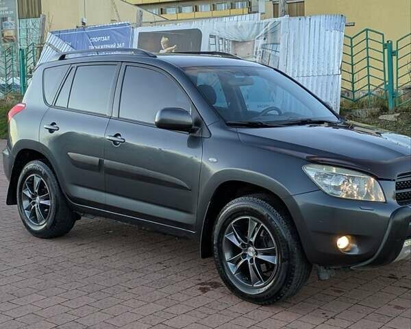 Сірий Тойота РАВ 4, об'ємом двигуна 2 л та пробігом 234 тис. км за 7950 $, фото 3 на Automoto.ua