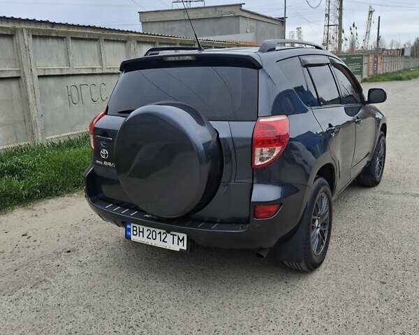 Серый Тойота РАВ 4, объемом двигателя 2 л и пробегом 225 тыс. км за 8500 $, фото 2 на Automoto.ua