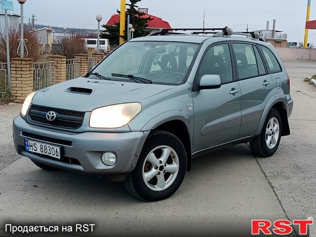 Серый Тойота РАВ 4, объемом двигателя 2 л и пробегом 250 тыс. км за 4250 $, фото 1 на Automoto.ua