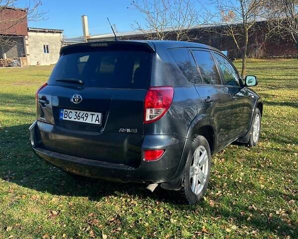 Серый Тойота РАВ 4, объемом двигателя 2.23 л и пробегом 310 тыс. км за 8800 $, фото 2 на Automoto.ua