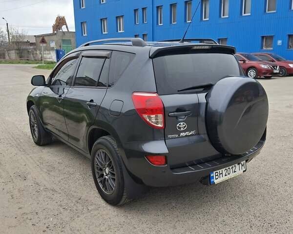 Серый Тойота РАВ 4, объемом двигателя 2 л и пробегом 225 тыс. км за 8500 $, фото 3 на Automoto.ua