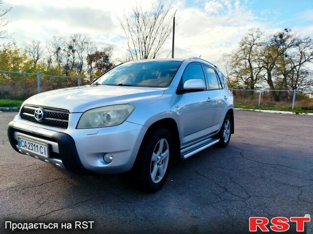 Серый Тойота РАВ 4, объемом двигателя 2 л и пробегом 196 тыс. км за 9100 $, фото 4 на Automoto.ua