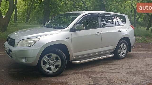 Серый Тойота РАВ 4, объемом двигателя 2.36 л и пробегом 213 тыс. км за 8500 $, фото 29 на Automoto.ua