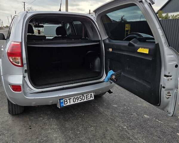 Сірий Тойота РАВ 4, об'ємом двигуна 2.23 л та пробігом 312 тис. км за 8000 $, фото 4 на Automoto.ua