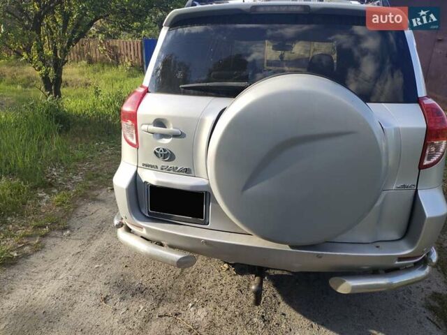 Серый Тойота РАВ 4, объемом двигателя 2.36 л и пробегом 196 тыс. км за 9500 $, фото 3 на Automoto.ua