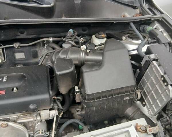 Серый Тойота РАВ 4, объемом двигателя 2.36 л и пробегом 146 тыс. км за 10900 $, фото 7 на Automoto.ua