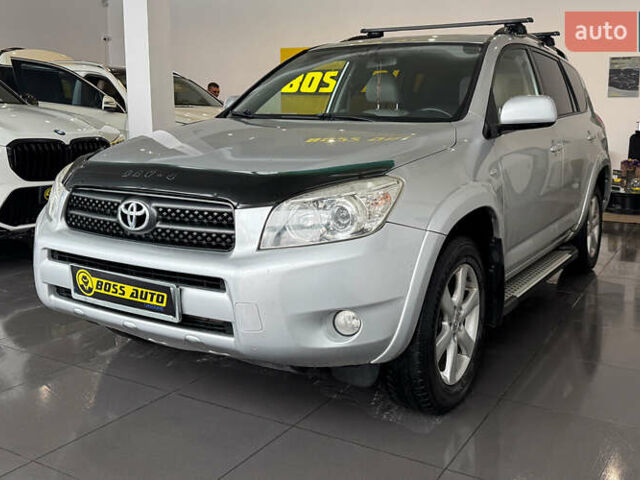 Сірий Тойота РАВ 4, об'ємом двигуна 2.36 л та пробігом 144 тис. км за 11000 $, фото 2 на Automoto.ua