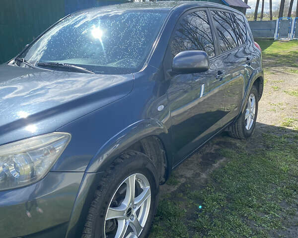 Серый Тойота РАВ 4, объемом двигателя 2.23 л и пробегом 203 тыс. км за 9990 $, фото 3 на Automoto.ua